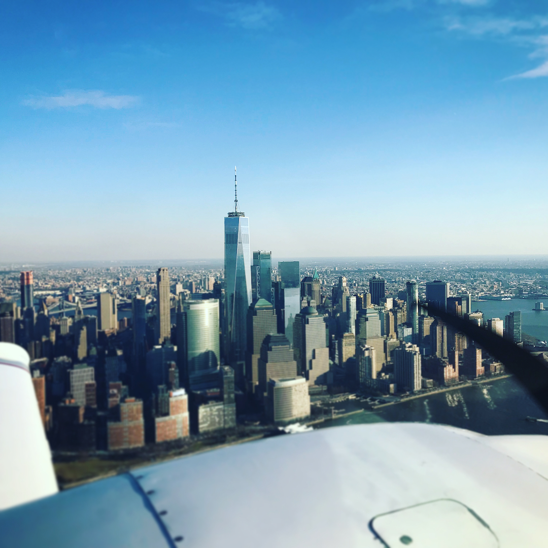 A view of Lower Manhattan from an airplane over the Hudson.